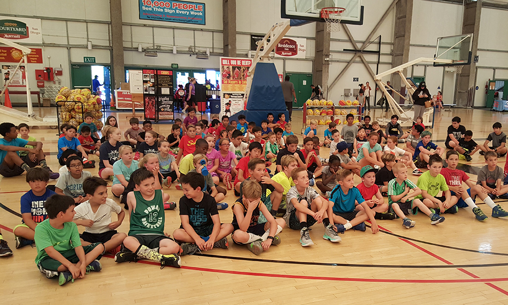 Campers gathered on the court at a Sol camp